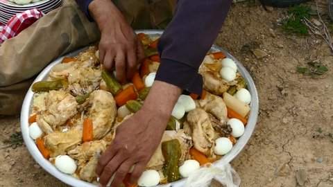 THIS video contains : Algerian couscous with various vegetables eggs and chicken meat
