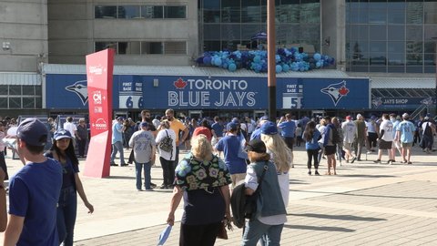 Toronto, Ontario, Canada October 2021 New normal with Toronto Blue Jays baseball fans arriving at stadium fully vaccinated for COVID 19 delta variant coronavirus.