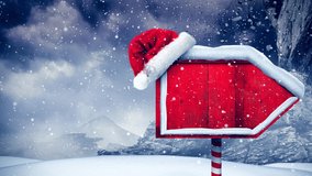Snow falling and santa hat over red wooden sign post on winter landscape. christmas festivity and celebration concept - Powered by Shutterstock - Get 15% off with code: PIKWIZARD15