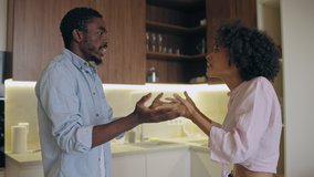 Emotional couple fight, wife and husband shouting in kitchen, marriage breakdown - Powered by Shutterstock - Get 15% off with code: PIKWIZARD15