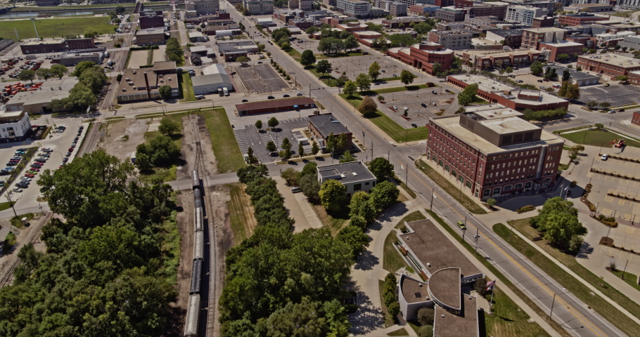 Des Moines Iowa Aerial daytime flight over the Des Moines river and bridges towards 801 Grand - 6k footage - August 2020