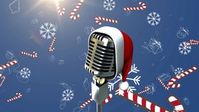 Animation of retro microphone with santa hat over snow and candy canes falling on blue background. new year, winter, tradition and celebration concept digitally generated video. - Powered by Shutterstock - Get 15% off with code: PIKWIZARD15
