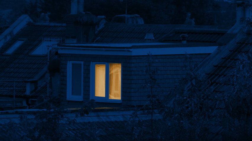 Light On In Bedroom At Top Of House At Night