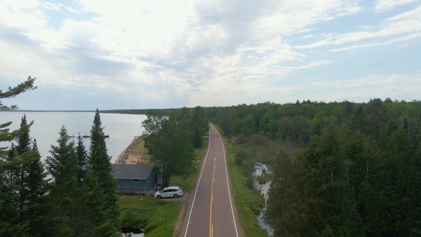 Aerial view of a road next to Lake Superior, highway scenic drive, Madeline island wisconsin