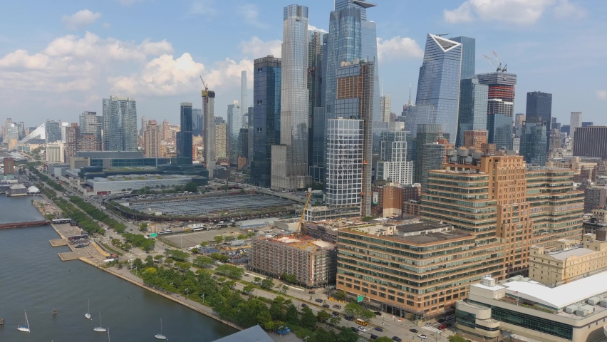 This video shows beautiful aerial views of Westside of Manhattan. The video also shows the Hudson River and the new skyline of the Hudson Yards.   | Shutterstock HD Video #1080191084