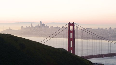 Golden Gate Bridge Marin County California USA 2020. Ariel Drone view of the North Tower of the Golden Gate Bridge with city skyline showing Sales Force Tower, Transamerica Pyramid and Coit Tower.