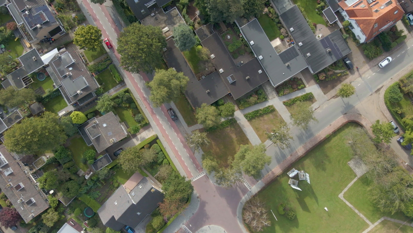 Top down aerial of a peaceful and wealthy suburban neighborhood Royalty-Free Stock Footage #1080197723