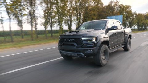 Minsk, Belarus - September 10, 2021: Dodge Ram TRX drives on a highway. Ram TRX is the most powerful series production pick-up. Its 6,2-liter Supercharged V8 delivers 702 hp.