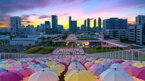 Zoom in,Time lapse 4k twilight sunset at Triple Street is a shopping mall in Songdo,Incheon South Korea.