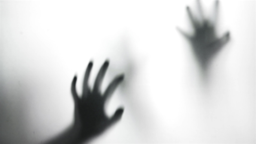 Silhouette of a zombie hand on white background
 Royalty-Free Stock Footage #1080207911