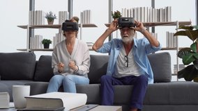 Senior mature couple sitting on the sofa having fun with virtual reality glasses, Happy elderly technology concepts
 - Powered by Shutterstock - Get 15% off with code: PIKWIZARD15