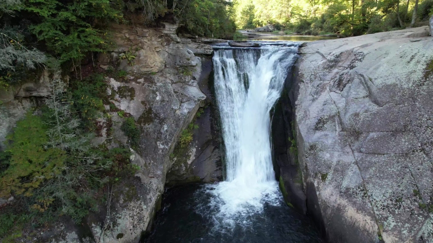 aerial push in to elk river falls in elk park nc, north carolina