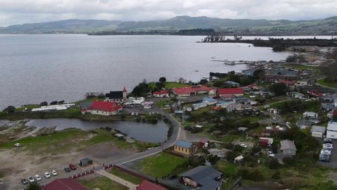 Beautiful aerial panoramic shot of Ohinemutu, living Maori village and original settlement in Rotorua, New Zealand