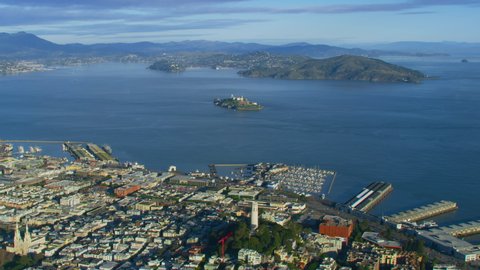 Aerial view of San Francisco. Coit tower and Alcatraz Island. Pacific Ocean and Oakland Coast in the background.