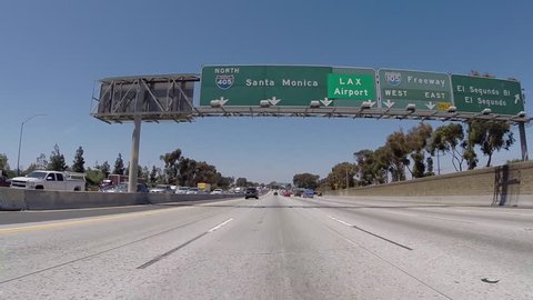 LOS ANGELES, CALIFORNIA, USA - July 10, 2015:  Overhead LAX Airport and Long Beach sign on the 405 San Diego Freeway North.