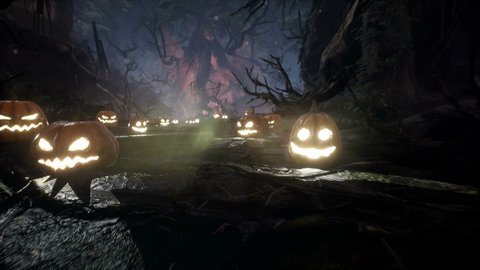 Scary dark mysterious forest with glowing pumpkins. Halloween horror concept. The Halloween Background animation is perfect for Halloween, horror or apocalypse backgrounds.