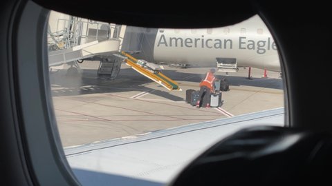 WASHINGTON DC, USA - SEPT 24, 2021: baggage handlers at DCA Reagan National Airport.