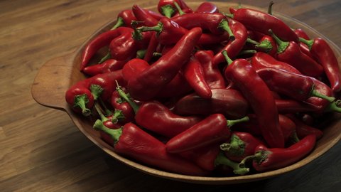 A bowl of ripe red New Mexico Chile ready to become part of a spicy and delicious southwest dish. Slide moment video 4K..