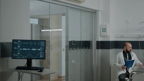 Heart rate monitor at clinic measuring pulse while doctor doing checkup with patient. Intensive care room at facility with medical equipment and technology for healthcare and recovery. - Powered by Shutterstock - Get 15% off with code: PIKWIZARD15