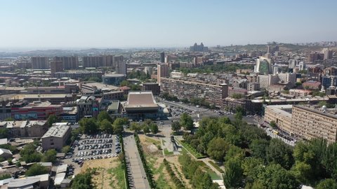  Yerevan, Armenia 15.09.2021 Aerial view urban cityscape Yerevan Armenia. Drone fly over soviet, old modern buildings in center of Yerevan. Architecture of the Soviet city with traffic on the roads.