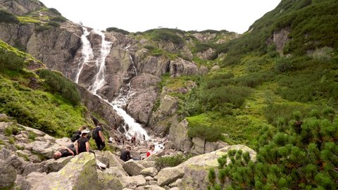 Zakopane, Poland - August 15, 2021: Siklawa waterfall or Wielka Siklawa in the High Tatras, on the Roztoka stream. It falls from the pond wall separating valleys of Pieciu Stawow Polskie and Roztoki