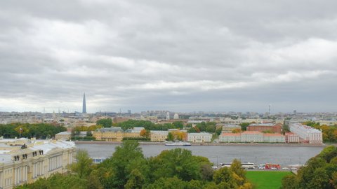 Aerial view of old St. Petersburg and the Admiralty spire, palace Square from the colonnade of St. Isaac's Cathedral in cloudy weather. Saint Petersburg. Russia.
