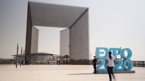 Dubai, United Arab Emirates, October 2021- Timelpase of people walking through the Gate entrance at the Expo 2020