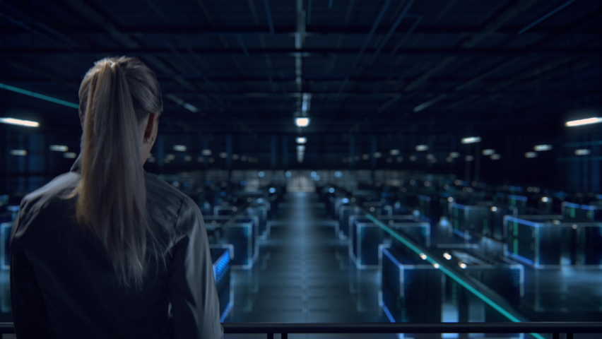 Female IT Specialist Uses Tablet Computer in Data Center. Turning Augmented VFX Visualization on Server Farm Cloud Computing Facility. System Engineer Working for Cyber Data Security Company. - Powered by Shutterstock - Get 15% off with code: PIKWIZARD15