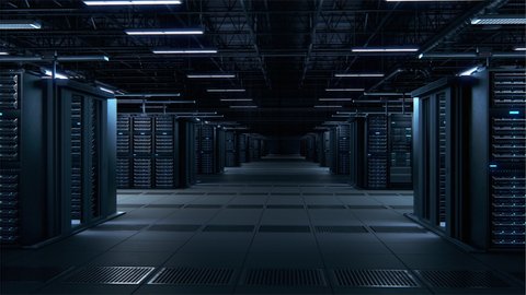 Modern Data Technology Center Server Racks Working in Dark Facility. Concept of Internet of Things, Big Data Protection, Storage, Cryptocurrency Farm, Cloud Computing. 3D Arc Camera Shot.