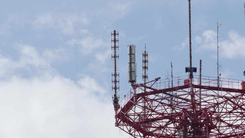 TIME-LAPSE: A telecommunication tower on a clouds background (close up) | Shutterstock HD Video #1080323432