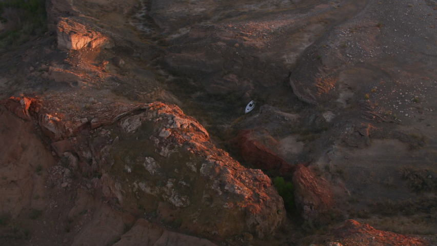 Lake Mead, Nevada circa-2021: Aerial view of boat stranded in dry canyon at Lake Mead. Shot with Cineflex from Helicopter with RED 8K.
