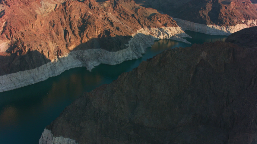 Lake Mead, Nevada circa-2021: Aerial view of Hoover Dam and Lake Mead. Shot with Cineflex from Helicopter with RED 8K.