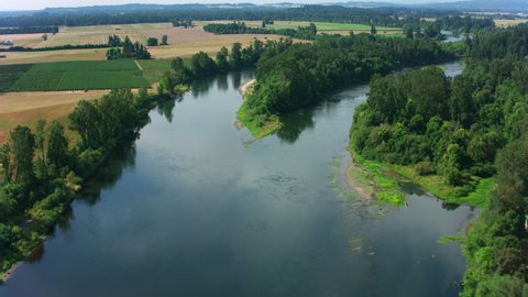 Oregon circa-2021: Aerial view of Willamette River near Salem. Shot with Cineflex from Helicopter with RED 8K.