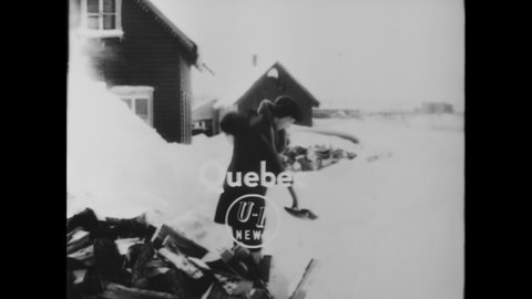 CIRCA 1955 - Quebec, Canada is buried in snow after a blizzard.