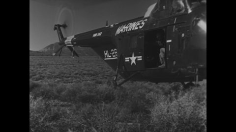 CIRCA 1955 - Atomic bombs are detonated in Yucca Flats, Nevada, and US Marines fly in helicopters over the test site.