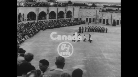 CIRCA 1954 - Canadian troops hold a ceremony at Fort Henry.