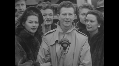 CIRCA 1950 - Donald O'Connor, Yvonne DeCarlo and their troupe of entertainers prepare to fly from California to Germany to entertain the troops.