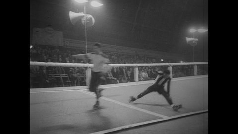 CIRCA 1951 - Women and men compete in roller derbies.