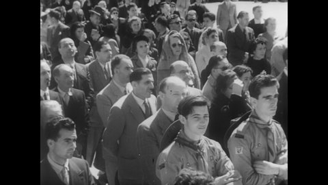 CIRCA 1950 - Catholics flock to Rome during Holy Year to pray for safety from atomic warfare, and also put their faith in the UN.