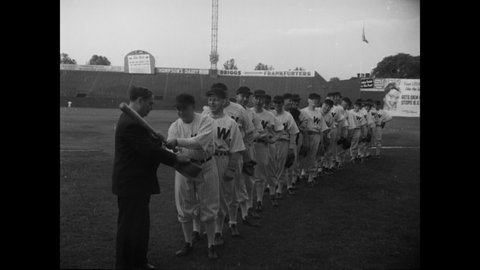 CIRCA 1948 - Democrat and Republican Congressmen arrive for the annual Congressional Baseball Game in Washington DC.