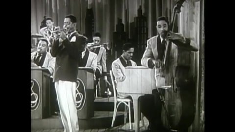 CIRCA 1946 - In this race musical, Dizzy Gillespie plays the trumpet with his band.