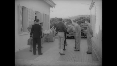 CIRCA 1940s - Allied officers leave a meeting at the US headquarters in New Caledonia.