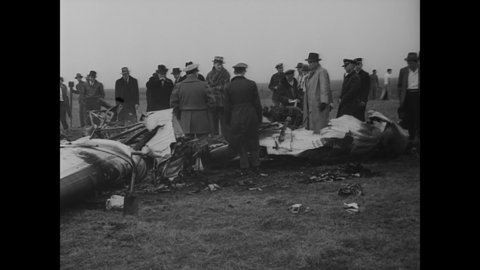 CIRCA 1939 - People inspect the wreckage of a deadly plane crash in Oklahoma City, Oklahoma.
