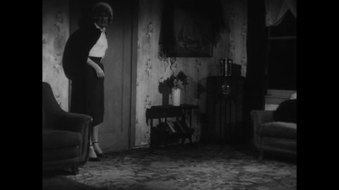 CIRCA 1953 - A trans woman faints when she gets home and has a nightmare about a man (Bela Lugosi) making strange foreboding warnings.