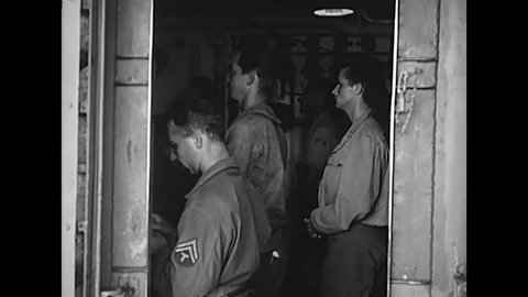 CIRCA 1945 - Catholic mass is held aboard a US Army troop transport ship.