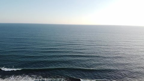 A drone shot from the hotels zoom up to the Pacific Ocean