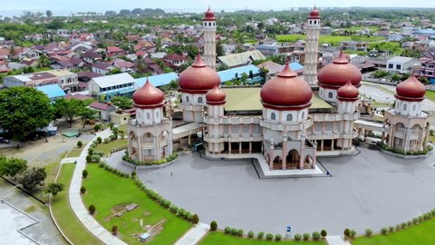 Aerial view of the Great Mosque of West Aceh with drone movement to the left