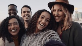 Female calling a diverse group of friends to take a selfie on a smart phone outdoors on a rooftop. High quality 4K footage. - Powered by Shutterstock - Get 15% off with code: PIKWIZARD15