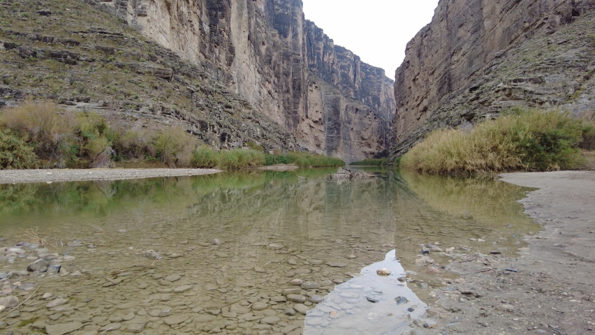 Camera Lifts Over Rio Grande And Santa Elena Canyon in Big Bend National Park