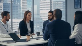 Modern Multi-Ethnic Office Conference Room Meeting: Diverse Team of Ambitious Top Managers, Executives Talk, Brainstorm, Use Tablet. Businesspeople Discuss Investment Strategy in e-Commerce Startup - Powered by Shutterstock - Get 15% off with code: PIKWIZARD15